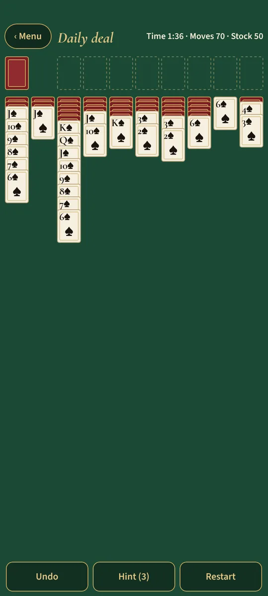 Spider solitaire in the middle of a deal